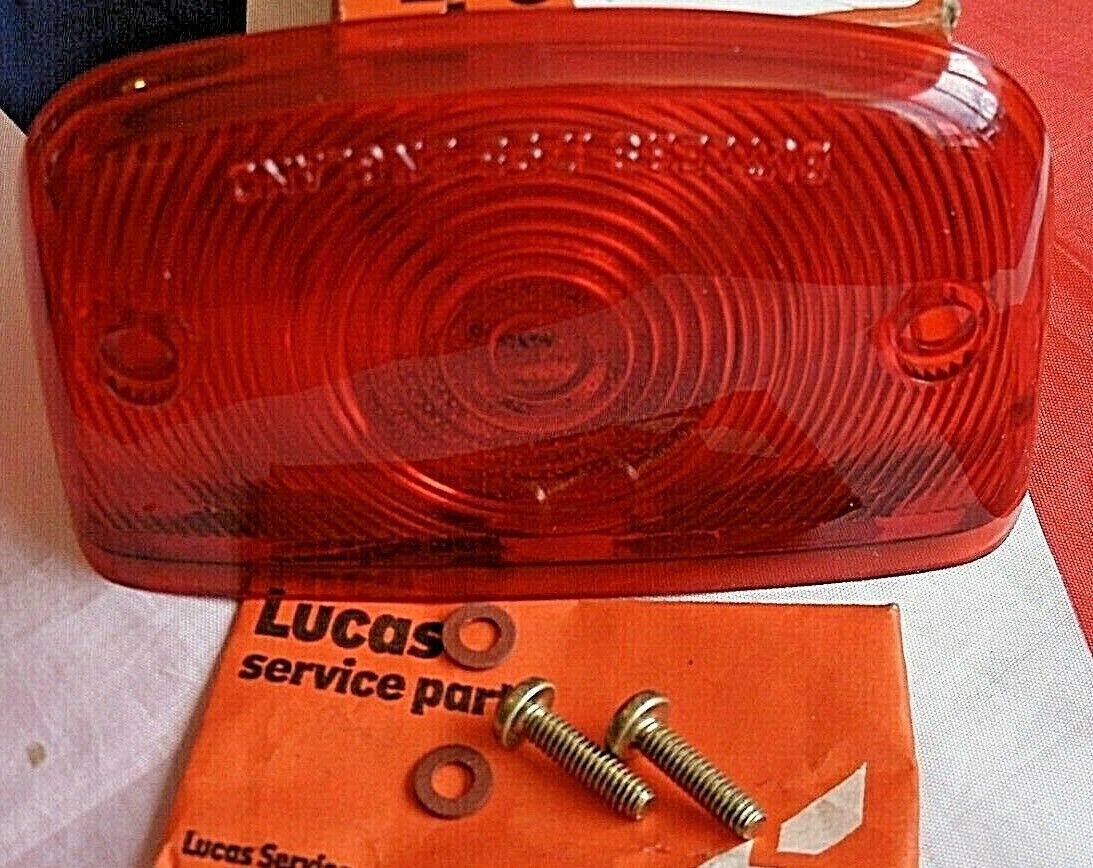 One New Old Stock Red Bedford TK Rear Light Lens Lucas Butlers With Fitting Kit.