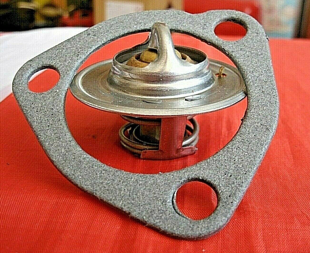 MGB & MGB GT 82% Thermostat with Bleed Bypass & Improve Quality Housing Gasket.